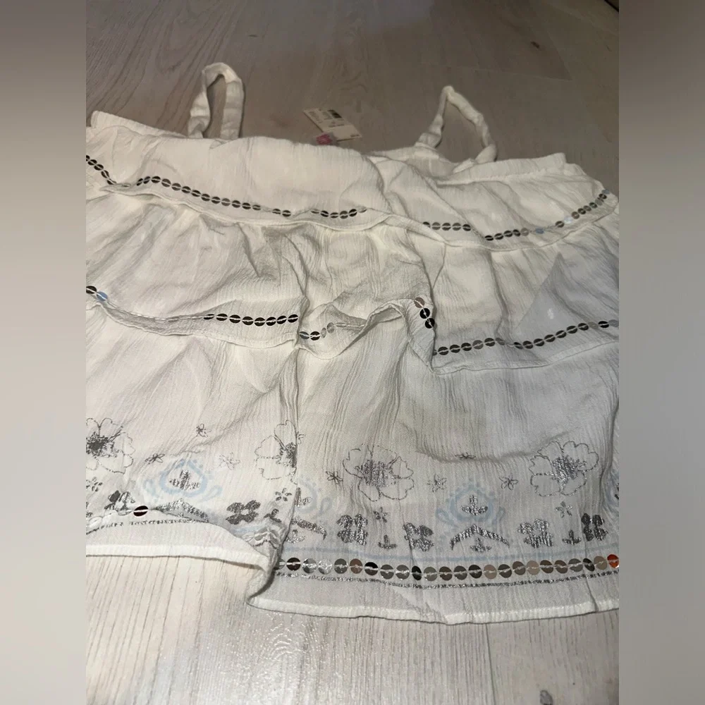 New justice ruffle top